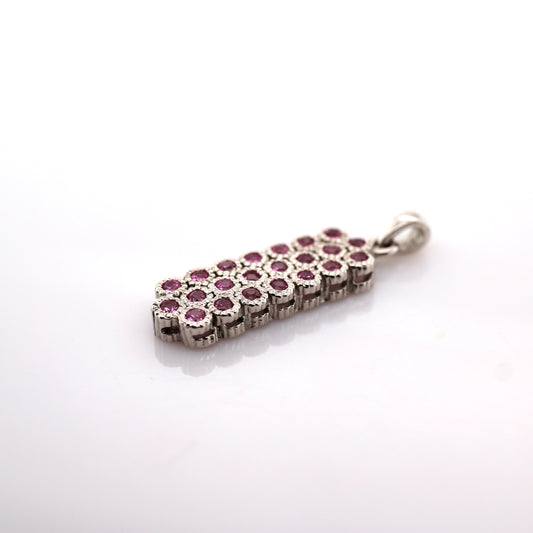 Pink sapphire pendant in 18K white gold