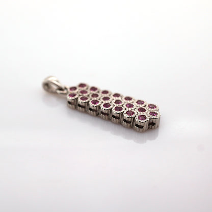 Pink sapphire pendant in 18K white gold
