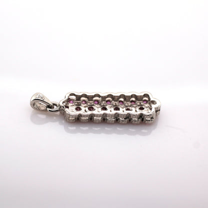 Pink sapphire pendant in 18K white gold