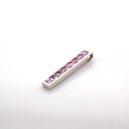 Pink sapphire pendant in 18K white gold