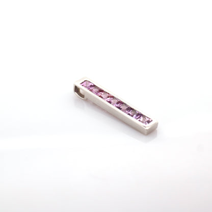 Pink sapphire pendant in 18K white gold
