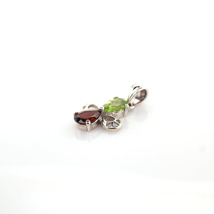 peridot and garnet pendant in silver