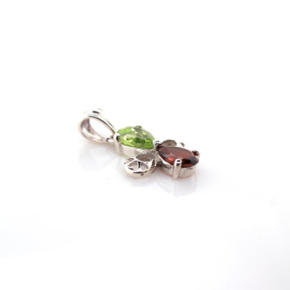 peridot and garnet pendant in silver
